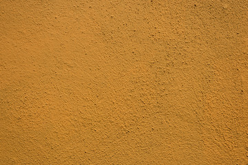 Texture from brown plaster on wall