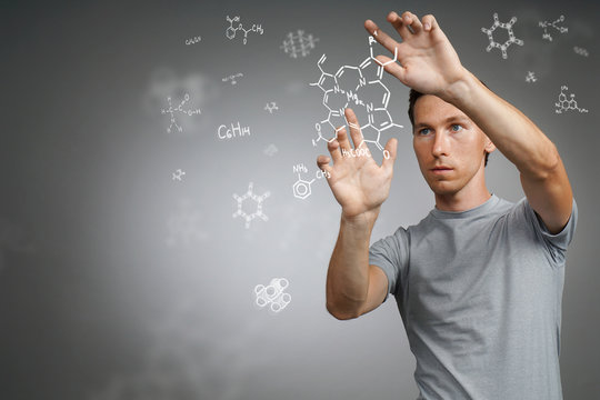 Man scientist working with chemical formulas on gray background. - Powered by Adobe