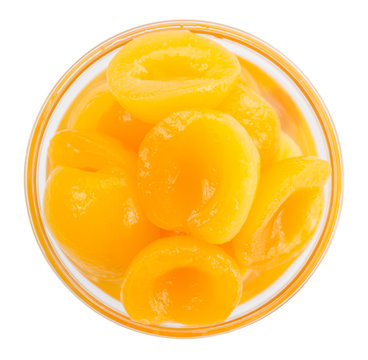 Portion of Pickled Apricots isolated on white