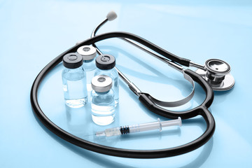 Medical supplies on light background. Vaccination concept
