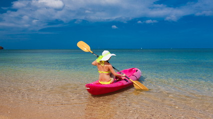 Thailand. Woman sea, bikini, hat, tan, kayak