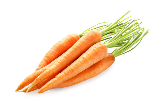 Fresh organic carrots on white background