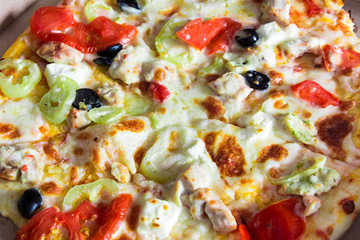 Pizza to order. Pizza in a cardboard box.