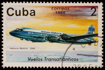 Passenger aircraft Douglas DC-4 on postage stamp