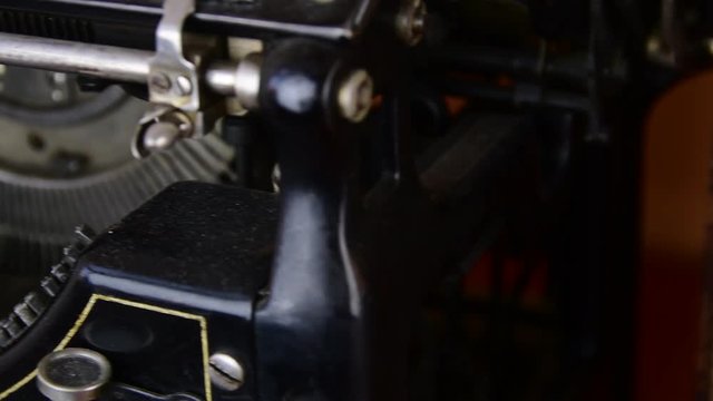 Vintage books. View of row of old books and vintage typewriter