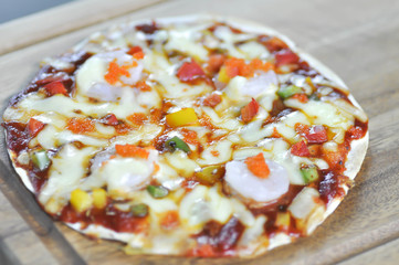 shrimp pizza in the tray