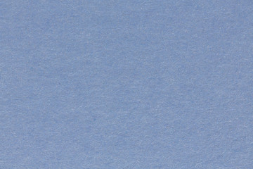 Light blue paper texture for background, close up.