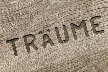 Träume Holzinschrift