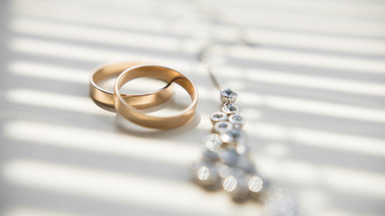 Golden wedding rings and juvelery, macro