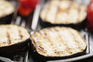 cooking eggplant and pepper on grill pan