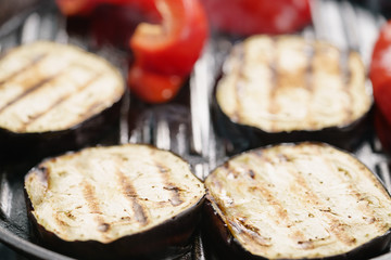 cooking eggplant and pepper on grill pan