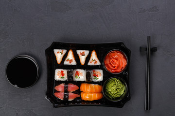 Set of sushi maki and rolls closeup in delivery box © Prostock-studio