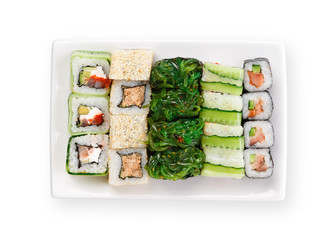 Sushi set on white plate, isolated, background