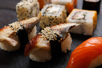 Set of sushi, maki and rolls background