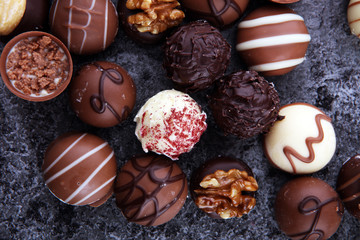 a lot of variety chocolate pralines, belgian confectionery gourmet chocolate