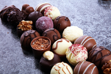 a lot of variety chocolate pralines, belgian confectionery gourmet chocolate