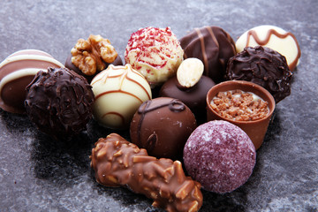 a lot of variety chocolate pralines, belgian confectionery gourmet chocolate