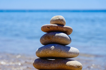 Fototapeta na wymiar beach stone balancing