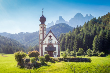 Fototapeta na wymiar Church of St. Johann of Nepomuk with Odle Group in the Dolomites, South Tyrol, Italy