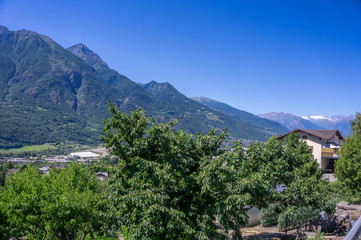 Fototapeta na wymiar Mountain Panorama with tree and blue sky
