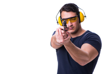 Man doing sport shooting from gun isolated on white