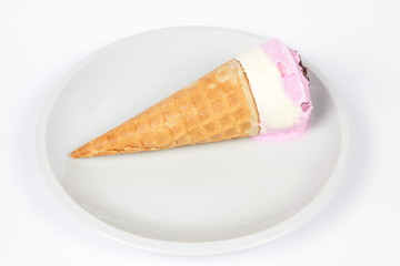 Ice cream in a white plate for a child