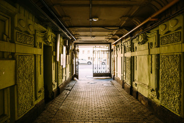 Old architecture corridor, Exit from the yard