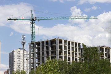 Fototapeta na wymiar Construction, high-rise, building tower crane close up