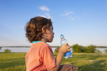 child drinks water