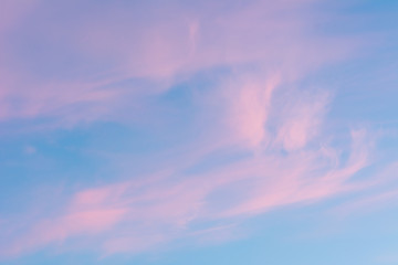 Background of the pastel color evening sky and amazing clouds.	