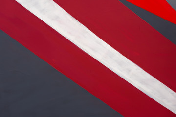 Abstract graffiti on the metallic wall, very small fragment. Street art close-up, fashion colors, stylish pattern. Can be useful for backgrounds