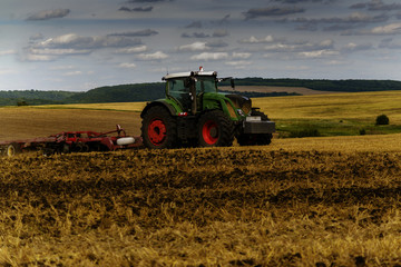 Harvesting wheat tractor