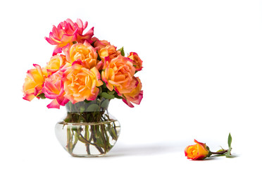 Wild roses bouquet in glass vase