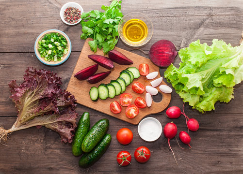 Clean eating healthy cooking ingredients. Vegetables,Tomato, lettuce, beets and cucumbers,  grains, greens,  copy space, top view. Diet, vegetarian food concept Food 