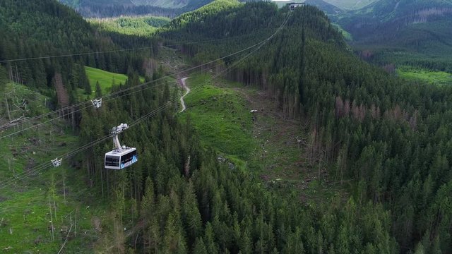 fligh over cableway in mountains