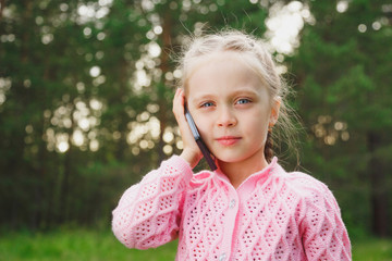 Little girl with mobile phone