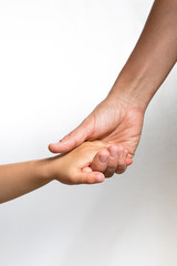 Fototapeta premium Close up of a woman's hand holding a child's hand