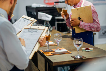 The coffee expert tests the preparation off  coffee drink.