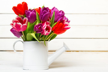 Tulip bouquet on  wooden background, copy space