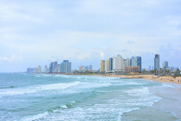 Naklejka premium TEL AVIV, ISRAEL - APRIL, 2017: View of the coastline of Tel Aviv in cloudy weather. Famous tourist view, overview