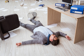 Businessman dead on the office floor