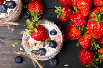 delicious dessert - yogurt with strawberries and blueberries