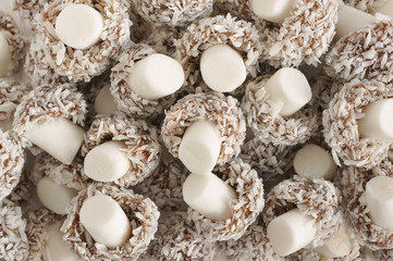 Coconut mushrooms a mushroom shaped sweet covered with desiccated coconut with a fondant stalk
