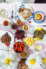 Table Set for Breakfast with Waffles and Berries