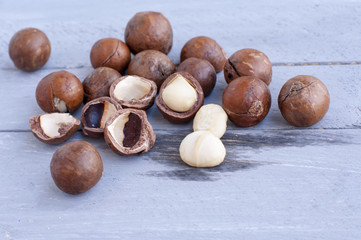 Macadamia is an Australian nut, a Kindal. On a wooden fob is a gray-blue color.