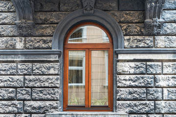 Old window on ancient wall