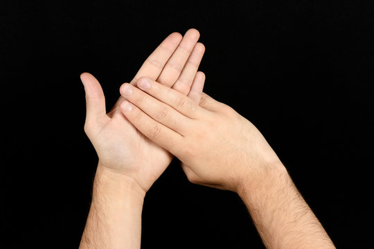 The language of the deaf English version of the gesture the letter M Signaling BSL