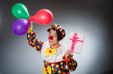 Funny clown in comical concept