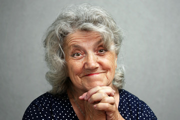 Emotional elderly woman face