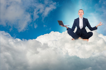 Businesswoman working in the sky and meditating